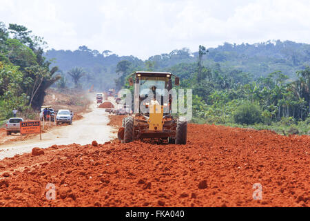 Earthmoving grader doing the works of Cuiaba Santarem highway BR-163 Stock Photo