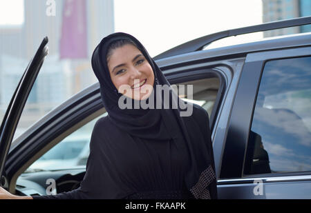 Young Emarati business woman in the car Stock Photo