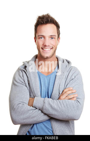 Happy man smiling with his arms crossed Stock Photo