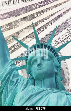 Detailed view of Statue of Liberty and background with money US dollar bills Stock Photo