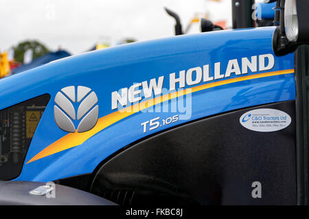 A brand new New Holland T5.105 Farm Tractor on sale at the 2015 Gillingham & Shaftesbury Agricultural Show, Dorset, UK. Stock Photo