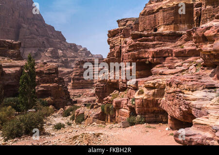 Rock formations in the carved red rock city of Petra, Hashemite Kingdom of Jordan. Stock Photo