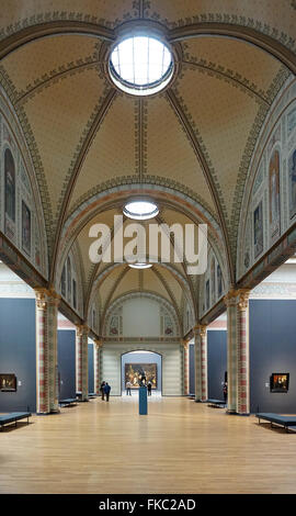 Rijksmuseum Amsterdam.Interior of the Rijksmuseum Amsterdam with The Night Watch (Nachtwacht) at the far end of the hallway Stock Photo