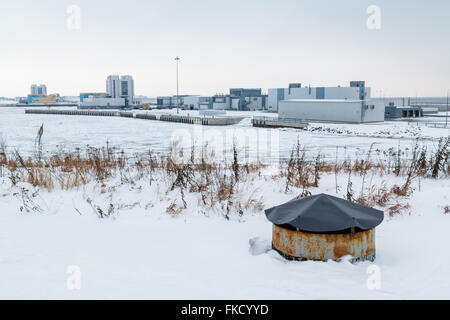 Industrial district on the bay in winter scene Stock Photo