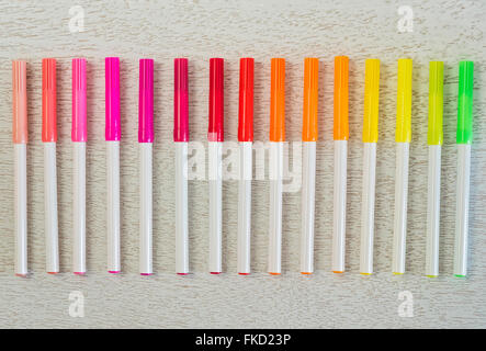 Multi colored felt tip pens in a row Stock Photo