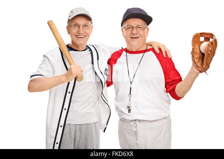Two senior men in baseball sportswear posing together and smiling isolated on white background Stock Photo