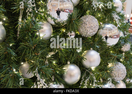 Christmas ornaments on tree Stock Photo