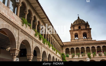 Low angle view of church against cloudy sky, Cusco, Peru Stock Photo