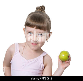 little ballerina with an Apple in a pink dress Stock Photo