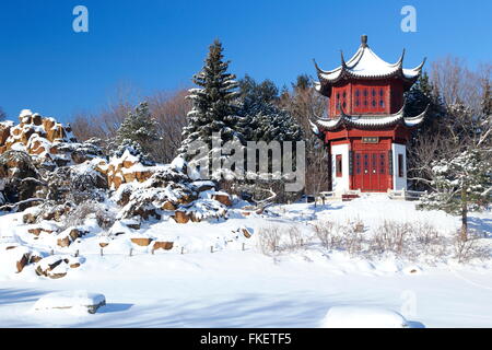 Chinese pavilion in snow at the botanical garden, Montreal, Quebec Province, Canada Stock Photo