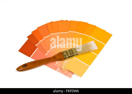 Paint Brush With Warm Tone Paint Samples Stock Photo