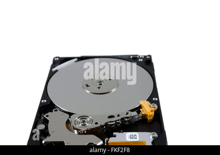 Picture of a hard disk without cover showing the read and write mechanism. Stock Photo