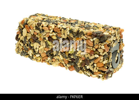 A birdseed block isolated on a white background. Stock Photo