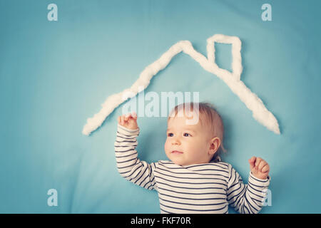 little boy with shape of house Stock Photo
