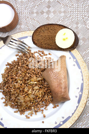 Skin of chicken neck or gooseneck, filled with chicken liver, onion, poultry fat and matzah meal, boiled in chicken bouillon and Stock Photo