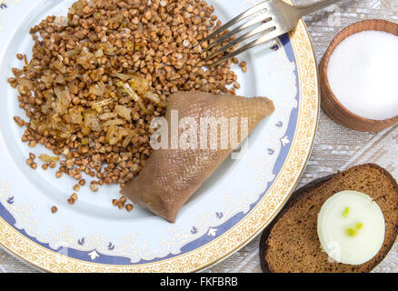 Skin of chicken neck or gooseneck, filled with chicken liver, onion, poultry fat and matzah meal, boiled in chicken bouillon and Stock Photo