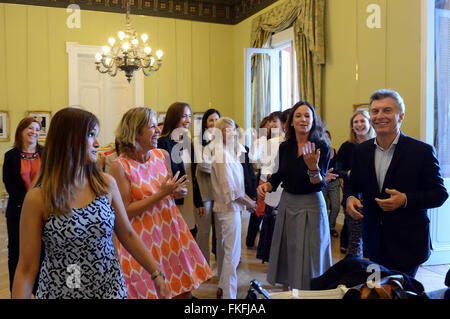 Buenos Aires, Argentina. 8th Mar, 2016. Argentina's President Mauricio Macri(1st R), receives a group of women on the occasion of the celebration for the International Women's day in the Scientists Hall of the Government House, in Buenos Aires, Argentina, on March 8, 2016. Credit:  Presidency/TELAM/Xinhua/Alamy Live News Stock Photo