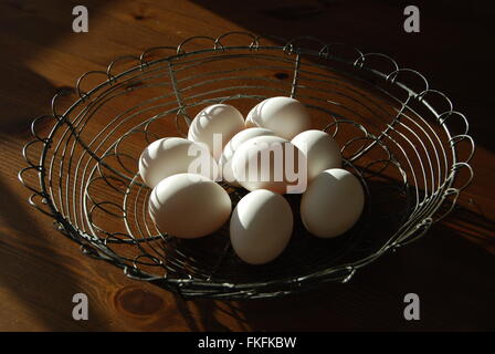Eggs in a basket Stock Photo