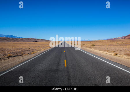 Endless straight road in Death Valley National Park, California, USA Stock Photo