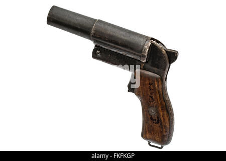 Old signal pistol, flare gun, isolated on white background Stock Photo