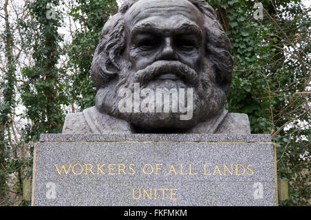 A large bronze bust marks the grave of the German political philosopher Karl Marx. Highgate cemetery, North London, England, United Kingdom. Stock Photo