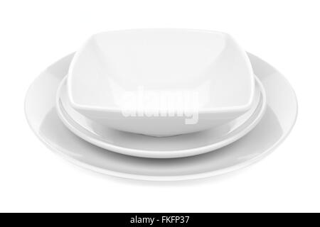 White ceramic dish set with plates and rounded square bowl isolated on white Stock Photo