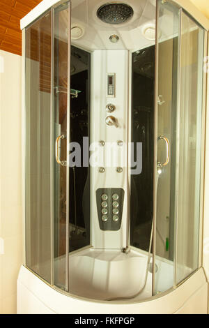 Modern bathroom interior with shower cabin and white toilet bowl Stock ...