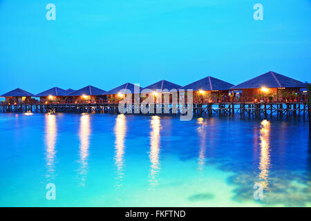 Twilight scene Living in the ocean at Mabul island, Malaysia Stock Photo