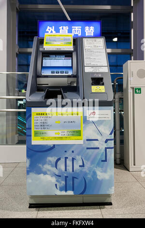 An automated currency exchange machine inside the Haneda Airport International Terminal Station on March 9, 2016, Tokyo, Japan. To provide better services for an increasing number of international travelers, Shinagawa Ward in collaboration with JTB Business Innovation Corp. provides two automated currency exchange machines at Tokyo Monorail's Haneda Airport Station. The machines have menus in English, Korean, Chinese and Japanese, and allow users to exchange multiple currencies in both directions. © Rodrigo Reyes Marin/AFLO/Alamy Live News Stock Photo