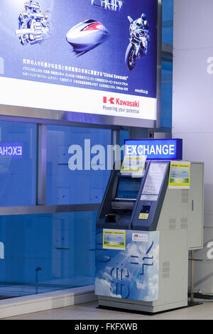 An automated currency exchange machine inside the Haneda Airport International Terminal Station on March 9, 2016, Tokyo, Japan. To provide better services for an increasing number of international travelers, Shinagawa Ward in collaboration with JTB Business Innovation Corp. provides two automated currency exchange machines at Tokyo Monorail's Haneda Airport Station. The machines have menus in English, Korean, Chinese and Japanese, and allow users to exchange multiple currencies in both directions. © Rodrigo Reyes Marin/AFLO/Alamy Live News Stock Photo