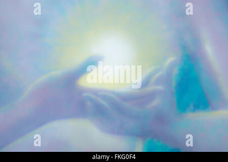 Painting the light in the middle hand, blurred for backgrounds. Stock Photo