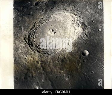 1968 - Apollo 8 Moon view: The crater Langrenus as photographed from an altitude of nearly 150 nautical miles as the Apollo 8 spacecraft orbited the moon on December 24th, 1968. Langrenus is about 85 statute miles in diameter. Command Moduel Pilot James A. Lovell described the crater, its central peak, and the conspicuous terrace on the inner crater wall shortly after acquiring earth communications for the first time after lunar orbit insertion. At the time the photograph was made, Langrenus was about 100 nautical miles (190 kilometres) south of the spacecraft ground track. The camera was poin Stock Photo