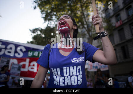 Buenos Aires, Argentina. 8th Mar, 2016. A woman shouts slogans during a march on the International Women's Day in Buenos Aires, capital of Argentina, March 8, 2016. Credit:  Martin Zabala/Xinhua/Alamy Live News Stock Photo