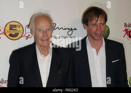 FILE PICTURES. GEORGE MARTIN, the 'Fifth Beatle' and British treasure who signed the Fab Four to a label contract when no one else would, produced virtually all their songs and introduced lavish arrangements into 'Yesterday' and 'A Day in the Life, ' has died. He was 90. Pictured: June 08, 2011 - Las Vegas, Nevada, U.S. - Sir George Martin and son Giles Martin at the Beatles LOVE by Cirque du Soleil 5th Anniversay Celebration held at the Mirage Hotel and Casino Las Vegas. Credit:  Paul Fenton/ZUMAPRESS.com/Alamy Live News Stock Photo