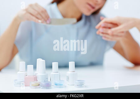 Close-up of acryl polishes on the table Stock Photo