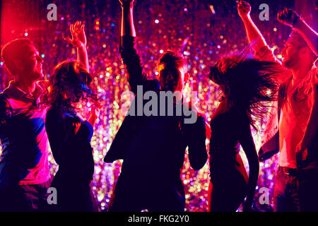 Young people dancing at party Stock Photo