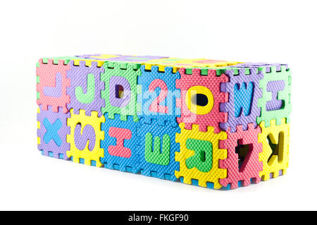 Rubber jigsaw puzzle for child development isolated on white background. Stock Photo