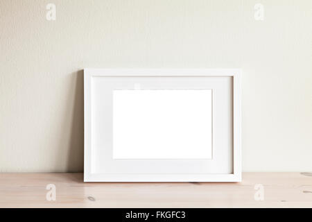 Image of a horizontal white frame mockup. Stock Photo
