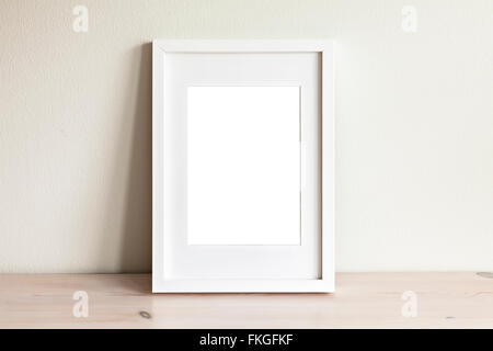 Image of a white frame mockup scene. Stock Photo