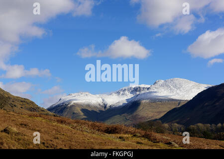 Wastwater with snow capped Lingmell, Scafell pike and Scafell in the background Stock Photo