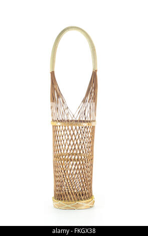 Thai traditional handmade style wine bottle bamboo woven basketry container isolated on white background. Stock Photo