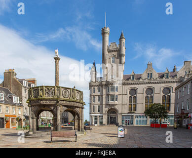 The Castlegate in Aberdeen, Scotland, UK, with the Mercat Cross in the foreground tand the Citadel building in the background Stock Photo