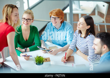 Casual people discussing something in a meeting Stock Photo