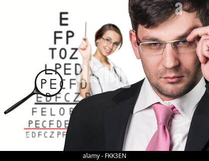 Man with glasses on eyesight test Stock Photo