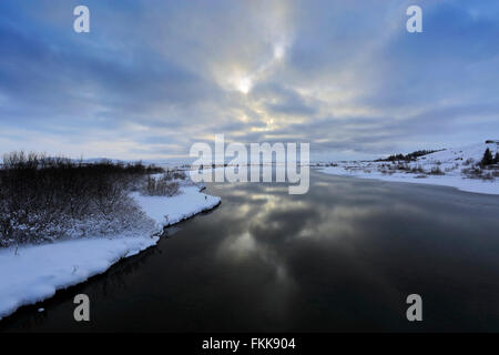 Winter snowy view over Pingvallavatn, the largest natural lake in Iceland, Pingvellir National Park, UNESCO World Heritage Site, Stock Photo