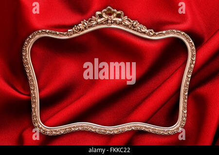 baroque golden frame with red silk decoration isolated on white ...