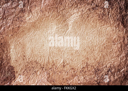 Parchment paper background with dark corners. Stock Photo