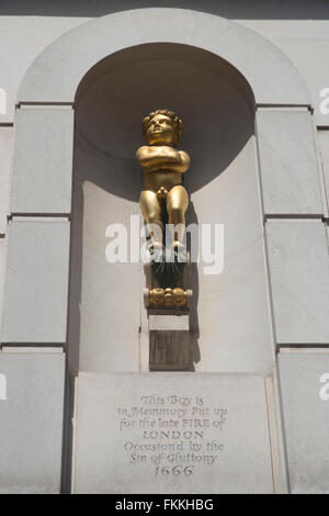 A view from below of The Golden Boy of Pye Corner, commemorating the fire of London. Stock Photo