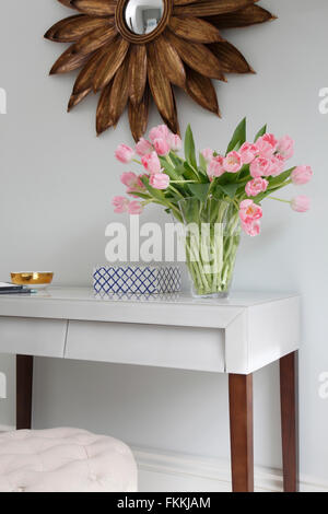 A view of a table and mirror, in a residential house. Stock Photo