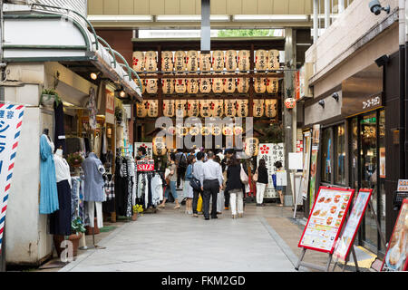 People visiting Nishiki Tenmangu Shrine, Kyoto, Japan Stock Photo